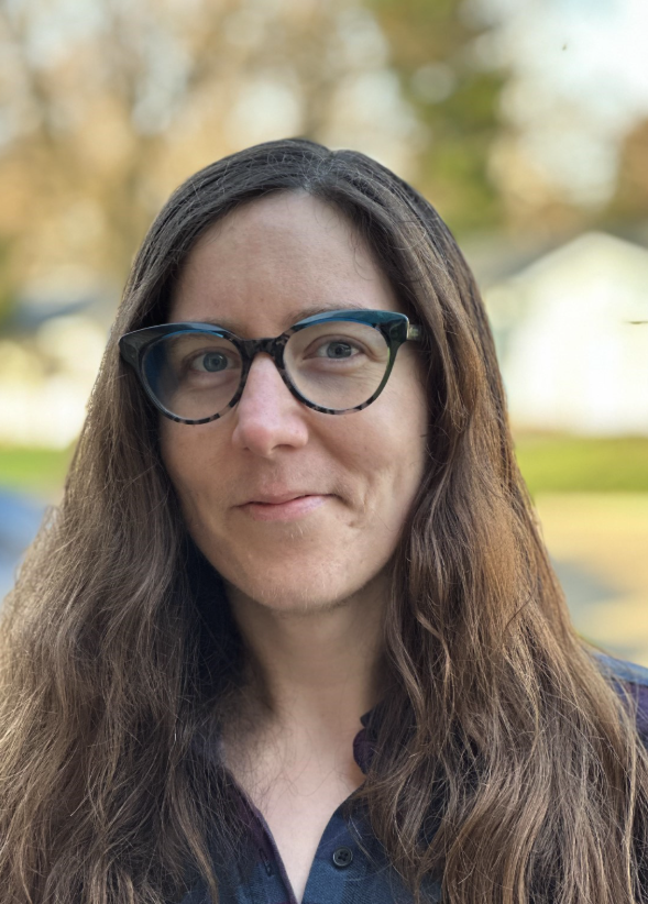A headshot of Ashley Hetrick smiling
