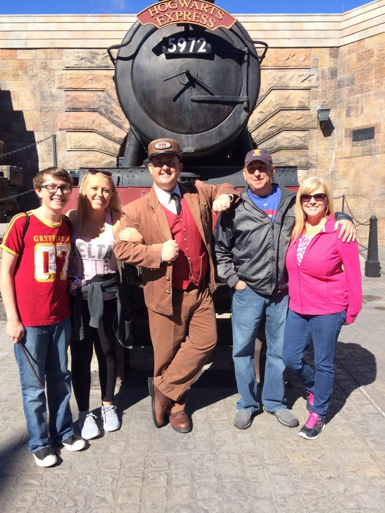 Lori and her family at Universal