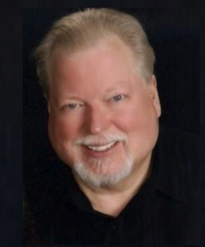 Headshot of Larry Dunham smiling