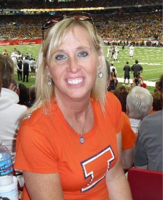 Headshot of Connie smiling wearing an Illinois t-shirt